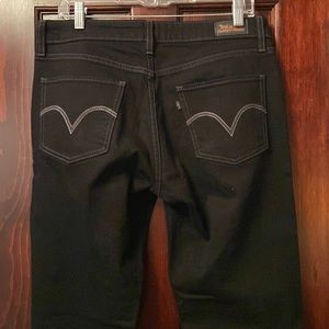 Lev’s black mid rise skinny size 12m